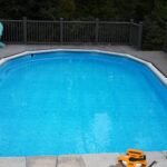 Oval Above-Ground Pool with Trex deck Pool service & safety cover Temple, PA